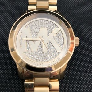 Michael Kors watch. Gold with faceted face.